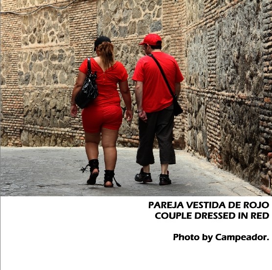 PAREJA VESTIDA DE ROJO - COUPLE DRESSED IN RED. Photo by Campeador.